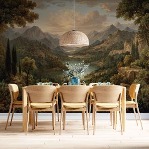 May include: A dining room scene featuring a light wood table and chairs with yellow cushions. The chairs are arranged around the table, set against a scenic landscape mural of mountains, trees, and a lake. A woven pendant light hangs above.