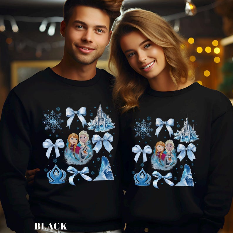 May include: Black sweatshirts featuring a winter-themed design with snowflakes, bows, and a castle. The sweatshirts also display the image of two girls and a snowman. The word "BLACK" is printed at the bottom.