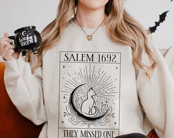 They Missed One Salem 1692 Sweatshirt, Witch Cat Halloween Sweatshirt, Salem Witch Shirt, Halloween Season Hoodie, Moon Cat Crewneck 283942