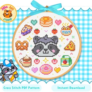 Puede incluir: Un patrón de punto de cruz con un mapache rodeado de iconos de comida como panqueques y pizza. El diseño está en un aro de madera y atado con una cinta azul. El texto en la parte inferior dice "Cross Stitch PDF Pattern" y "Instant Download."