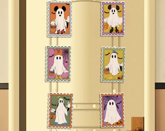 May include: Set of six Halloween-themed stickers featuring cartoon ghosts in stamp-like frames. Each ghost is white with black eyes and carries a trick-or-treat basket. The frames have orange, purple, and green borders, with decorative elements like bats and spiderwebs.