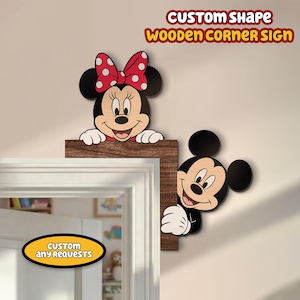 May include: Wooden corner sign featuring Minnie and Mickey Mouse. Minnie Mouse has a red bow with white polka dots. Mickey Mouse is smiling. The sign is brown and has the text "CUSTOM SHAPE WOODEN CORNER SIGN".