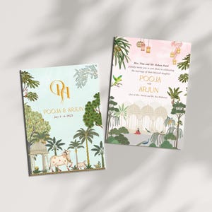May include: Two wedding invitation cards with a light blue and pink background. The cards feature a traditional Indian design with floral patterns, peacocks, and a couple standing in front of a palace. The text on the cards reads "Mrs. Nina and Mr. Rohan Patel cordially invite you to join them in celebrating the marriage of their beloved daughter POOJA with ARJUN (Son of Mr. Anant and Mrs. Radhika Mahant) July 4, 2023"