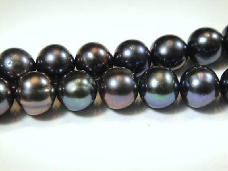 16 inch strand approx Peacock Potato Pearls 5mm