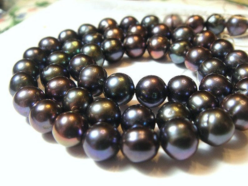 16 inch strand approx Peacock Potato Pearls 5mm