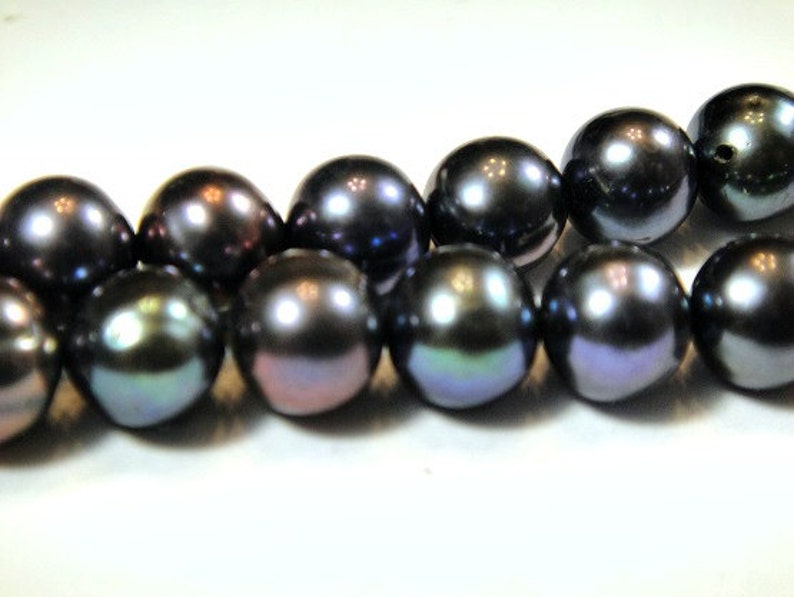 16 inch strand approx Peacock Potato Pearls 5mm