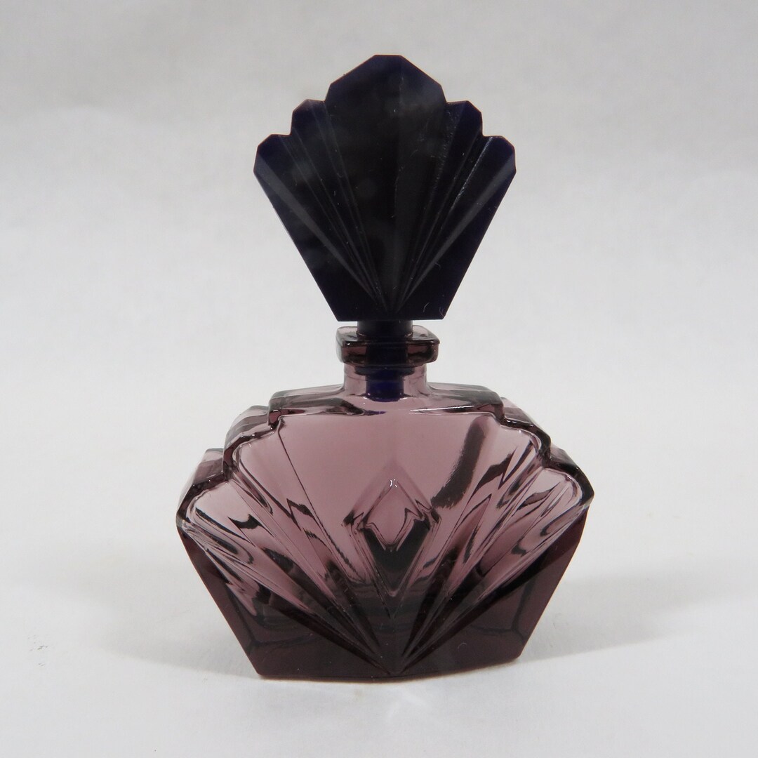 Elizabeth taylor online perfume purple bottle