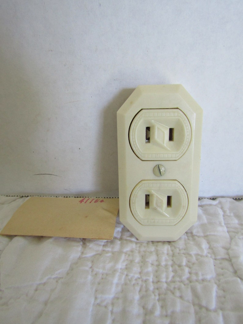 1 NOS Electric Surface Duplex Outlet Electrical Salvage in package nice ornate design around plugs Vintage