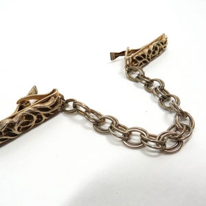 Sweater clip guard gold tone metal Vintage