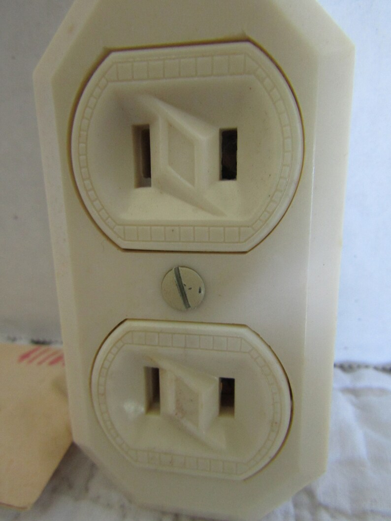 1 NOS Electric Surface Duplex Outlet Electrical Salvage in package nice ornate design around plugs Vintage