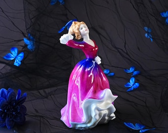Figura vintage de Royal Doulton Melissa HN 2467 – Diseñada por Peggy Davies, con vestido magenta y pose ondeando al viento, descatalogada, porcelana fina, Inglaterra, década de 1980.