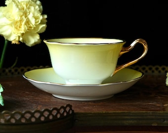 Juego de taza y platillo vintage Royal Albert: lustre amarillo degradado con asa y borde dorados, porcelana inglesa (década de 1950)