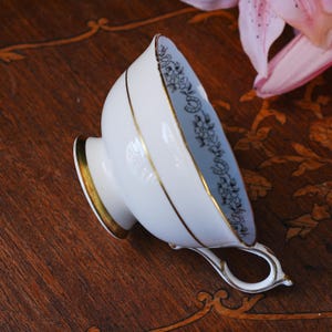 Vintage Paragon Gardenia Teacup & Saucer – White Bloom on Black, Powder Blue, Lucky Horseshoe Border, Double Royal Warrant, England 1940s image 9