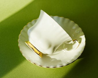 Vintage Royal Albert Bone China “Val D'Or” Teacup and Saucer Set - Elegant White with Gold Trim, England, 1960s Elegant Porcelain