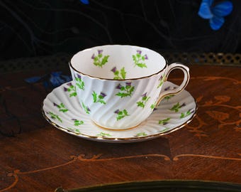 Vintage Aynsley Thistle Teacup and Saucer – Scots Pattern 15287, Swirl Fluted Body, Hand Painted Purple Blooms, Bone China England 1930s
