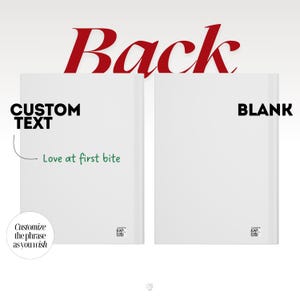 May include: Two white book covers shown from the back. The left cover features the text "CUSTOM TEXT" and "Love at first bite" in green. The right cover is blank. Both covers include a small barcode and the text "Customize the phrase as you wish."