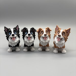 May include: Four stylized dog figurines standing in a row. Two are black and white with blue eyes, and two are brown and white with brown eyes. Each figure features a white chest, pointed ears, and an open mouth with a pink tongue showing.