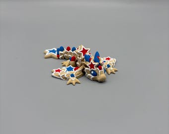 3D Printed Articulated Star Cookie Wyverns