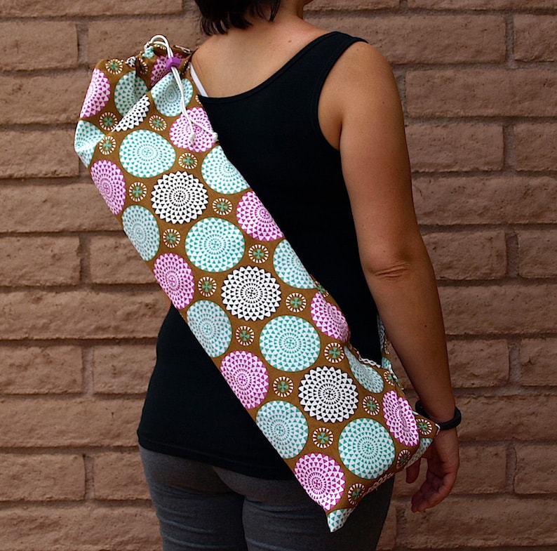 Yoga mat bag handmade with pocket in a neutral taupe with bursts of pink and light teal color in the shape of mums or pom poms BURST