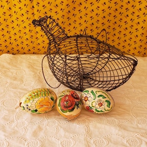 May include: A rustic wooden sign with the text "Welcome to our home" in white lettering. The sign features a distressed finish and a simple, inviting design, perfect for a front porch or entryway.