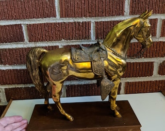 Vintage Large Heavy Golden Cast Metal Horse Statue with Western Saddle on Wood Base