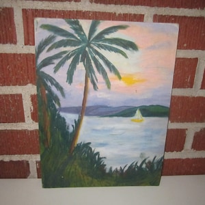 May include: A painting depicting a tropical sunset scene with palm trees and a sailboat on the water.