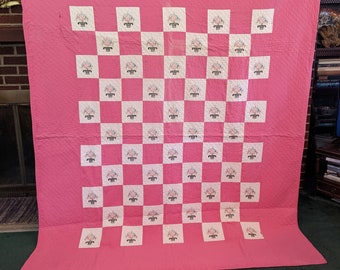 Vintage 1940s/50s Torn Hot Pink Cotton Handsewn Quilt with Embroidered Flower Baskets as found