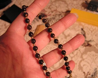 Matching tiger-eye necklace and earirngs with gold beads