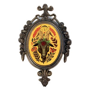 Black goat wall art in vintage metal oval frame gothic decor