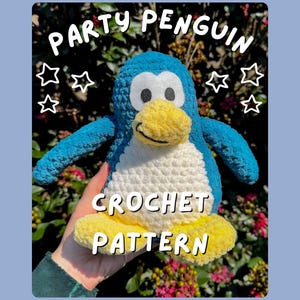 May include: A handmade crochet penguin in blue, white, and yellow. The penguin has a yellow beak and feet, with the text "PARTY PENGUIN CROCHET PATTERN" displayed on the image. The background is a soft blue.