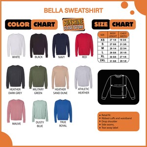 May include: A color chart for Bella sweatshirts, showcasing various colors like white, black, navy, and red. The image includes a size chart with measurements in inches and features like retail fit and drop shoulder.