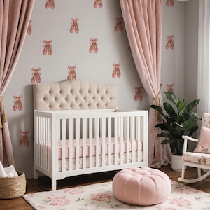 May include: A white ceramic mug with a black handle and the text "But First, Coffee" in a bold, black font. The mug is set against a blurred background, suggesting a cozy setting. The mug appears to be approximately 4 inches tall.