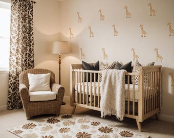 May include: A nursery with a light wood crib, a wicker armchair, and a patterned rug. The wall features giraffe decals. The crib has dark gray pillows and a cream-colored blanket. The curtains have a brown floral pattern.
