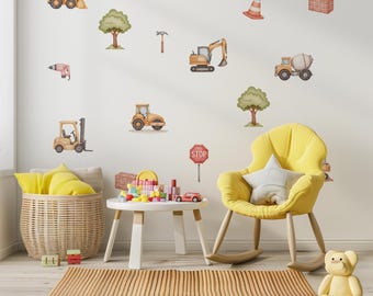May include: A set of watercolor wall decals featuring construction vehicles including a bulldozer, excavator, cement mixer, and forklift, along with a hard hat, traffic cone, hammer, brick pile, stop sign, and trees, arranged on a white wall.