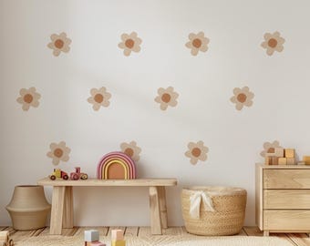 May include: A child's room with a white wall adorned with daisy decals. A wooden bench holds a toy train and a rainbow arch. A woven basket and a wooden dresser are also present. A rug and wooden blocks complete the scene.