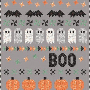 May include: A Halloween-themed quilt with a grey background. The design includes orange stars, black bats, green and black pinwheels, white ghosts, orange triangles, and orange pumpkins. The word "BOO" is in large black letters.