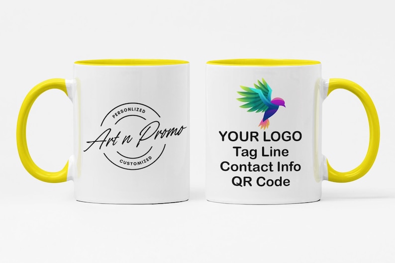 May include: White ceramic mug with a yellow rim and handle. The mug has a black logo that says "Art n Promo" with the words "Personalized" and "Customized" in smaller font. The other side of the mug has a colorful bird graphic and the text "YOUR LOGO, Tag Line, Contact Info, QR Code".