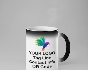 May include: A white ceramic mug with a black handle. The mug has a color changing design that reveals a colorful bird and the text "YOUR LOGO Tag Line Contact Info QR Code" when hot liquid is poured into the mug.