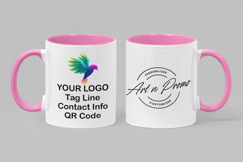 May include: White ceramic mug with a pink rim and handle. The mug features a colorful bird logo and the text "YOUR LOGO, Tag Line, Contact Info, QR Code". The opposite side of the mug has a black circle with the text "Personalized Art n Promo Customized".