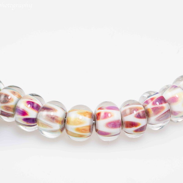 Handmade Glass Lampwork Bead set of 10 Terranova on white encased in clear.