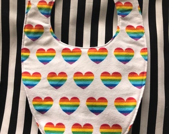 Rainbow hearts on white flannel baby bib