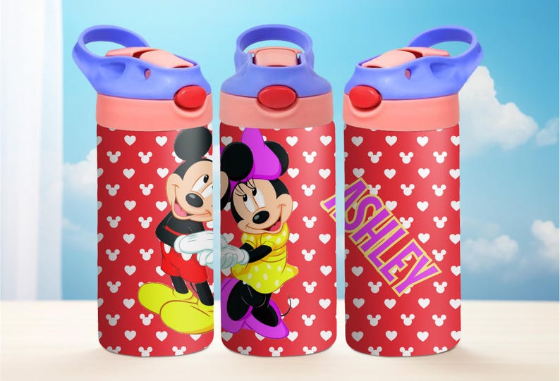May include: Three red and white water bottles with a Mickey Mouse and Minnie Mouse design. The bottles have a blue lid and a pink base. One bottle has the name "Ashley" written on it in purple letters.