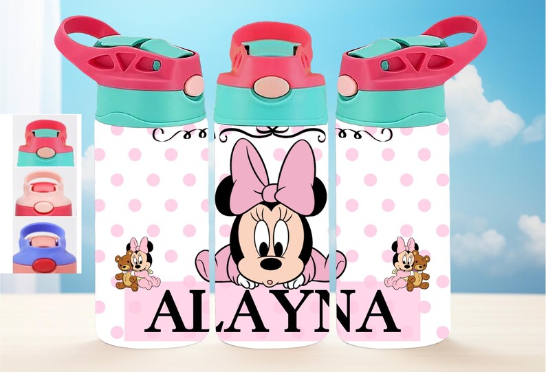 May include: Pink and white water bottle featuring a Minnie Mouse design. The bottle has a pink lid with a blue handle and a pink polka dot pattern. The Minnie Mouse design includes a pink bow and the name "ALAYNA" in pink letters.