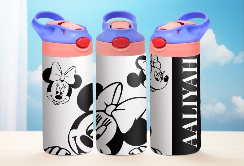 May include: Three white water bottles with black and white images of Minnie Mouse. The bottle on the right has the name "Aaliyah" written in black on a black background.