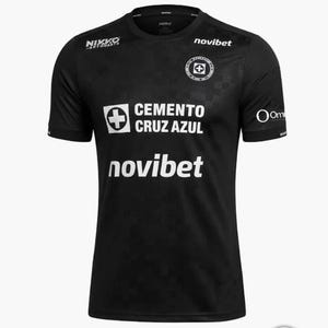 May include: Black short-sleeved jersey with white logos and text. The jersey features the text "CEMENTO CRUZ AZUL" and "novibet" in white. A team logo is on the chest. The jersey also has the text "NIKKO" and "novibet" on the shoulders.