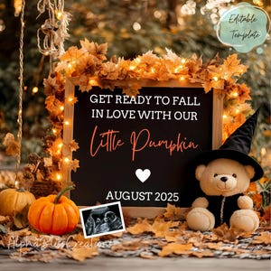 May include: A chalkboard sign with the text "GET READY TO FALL IN LOVE WITH OUR LITTLE PUMPKIN AUGUST 2025" surrounded by fall leaves and lights. A teddy bear wearing a witch hat and a pumpkin are in the foreground. An ultrasound image is in the bottom left corner.