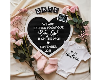 May include: A black heart-shaped letter board with white trim, announcing a baby girl is on the way in September 2025. The board is surrounded by pink roses and baby socks. A white onesie with the text "Baby Walker" is also included.