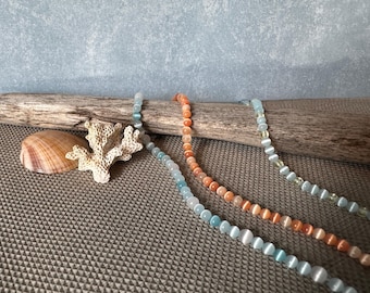 Stretchy cat eye bead bracelet. Choose the size and color.