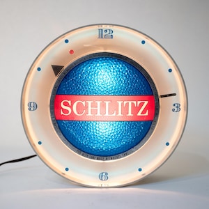 Mid Century Schlitz Beer Motion Clock Illuminated 9&quot; Diameter Blue and White Vintage 1960s