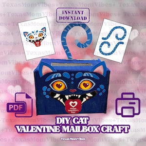 May include: A DIY cat Valentine mailbox craft. The blue mailbox features a cat face design with heart-shaped eyes and a heart-shaped tongue. Includes printable cat face and tail cutouts. The text "Happy Valentine's Day!" is on the tongue.